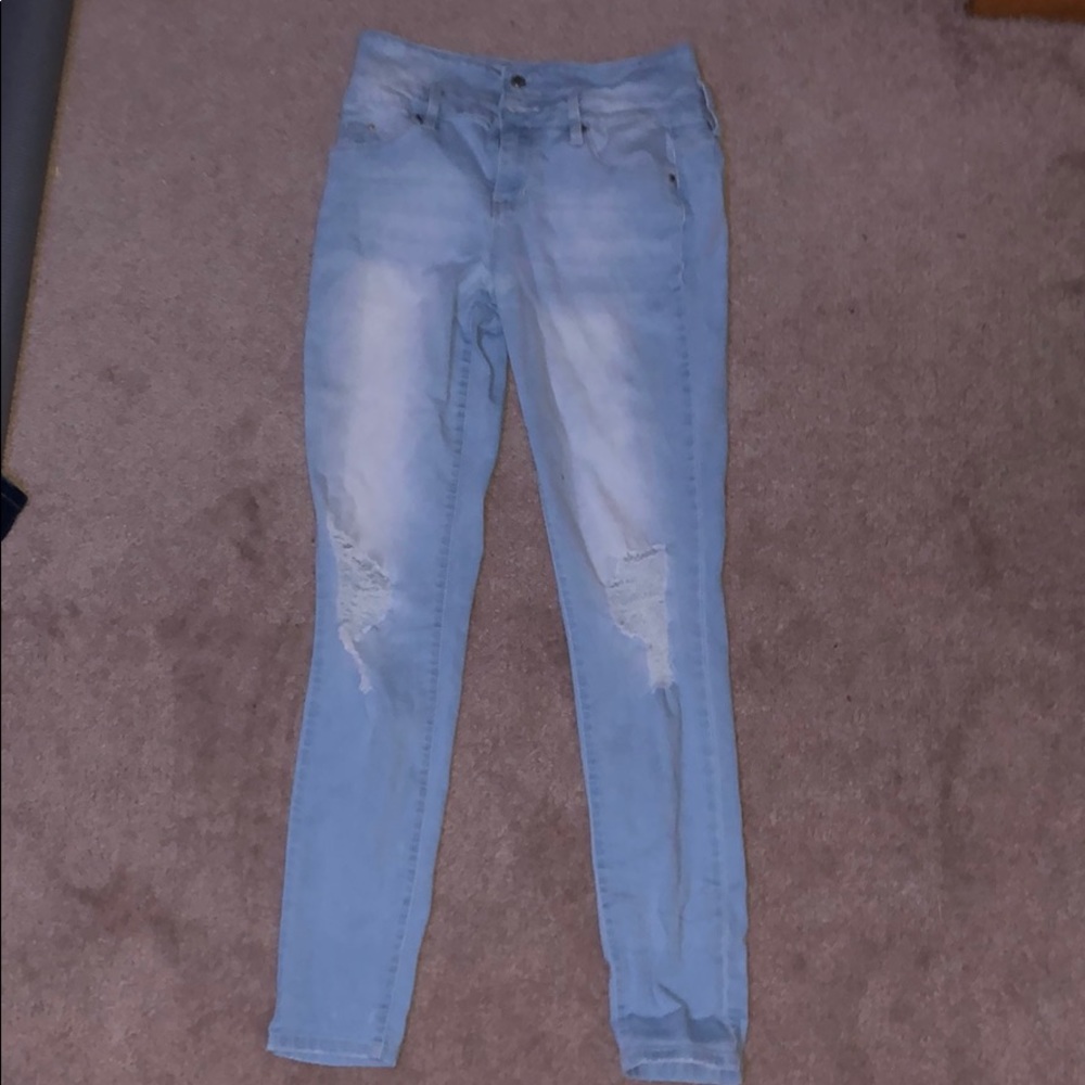 Ripped light blue jeans